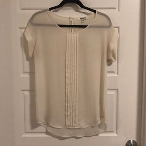 White pleated blouse
